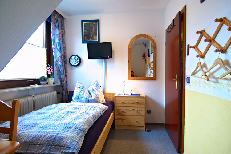 Ferienwohnung Dibbersen - kleines Schlafzimmer